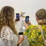 A Bite Out of Controversy: The Latest Twist in Cattelan’s Comedian Saga